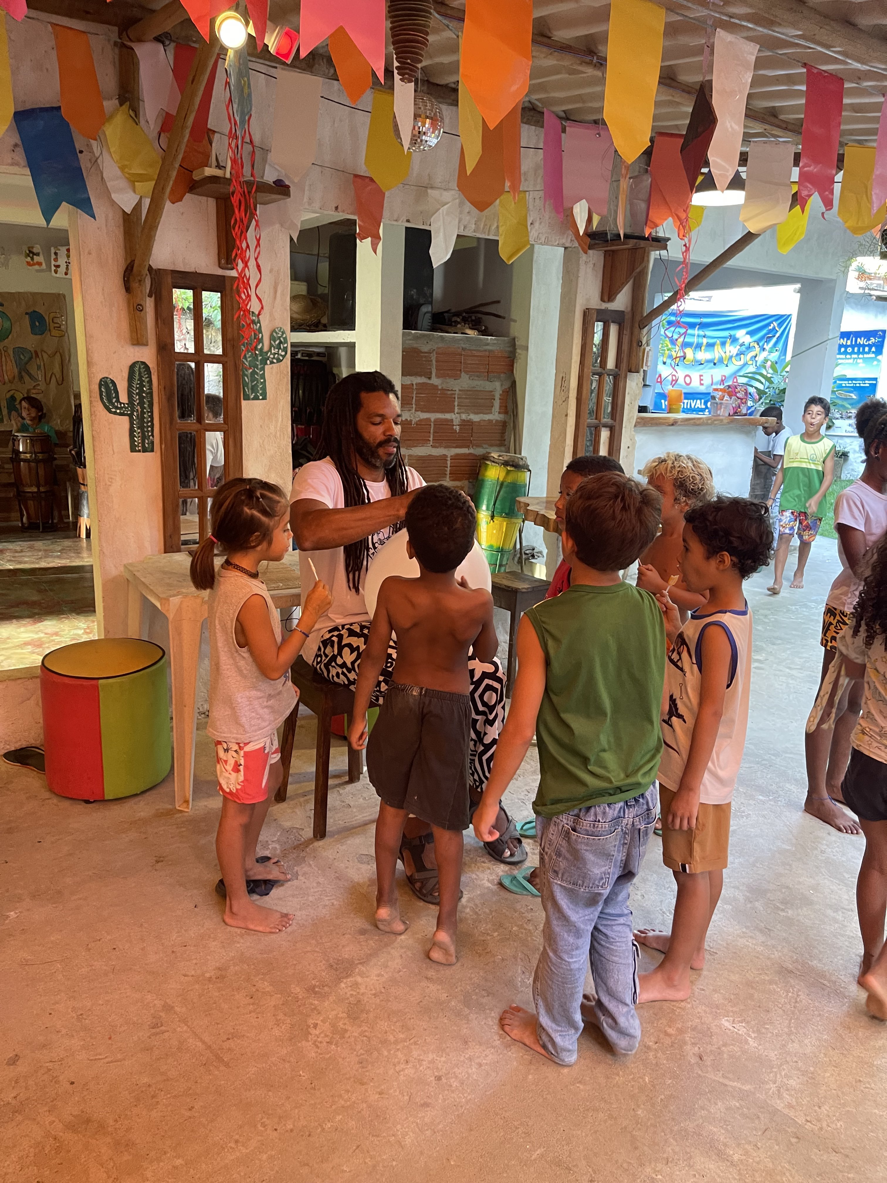 Bico Duro with the kids on Children's Day, Tribo Bahia Mirim